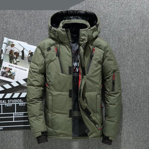 Green winter jacket with red zippers on a gray background