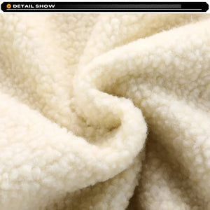 Close-up of beige fleece fabric with a brand logo at the top.