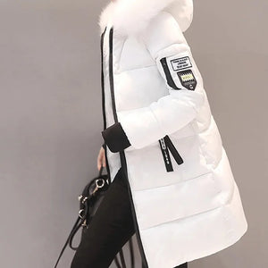 White puffer vest with black accents on a plain background