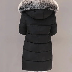 Black winter coat with fur hood on a gray background