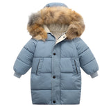 Blue children's puffer jacket with fur hood on a white background