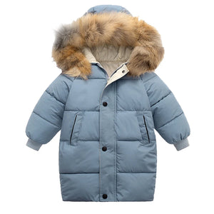 Blue children's puffer jacket with fur hood on a white background
