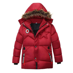 Red puffer jacket with fur-lined hood on a white background