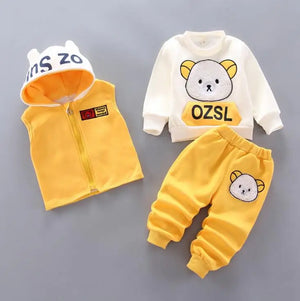 Children's clothing set with yellow vest, white shirt, and pants on a gray background