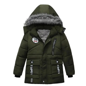 Green winter jacket with fur-lined hood on a white background