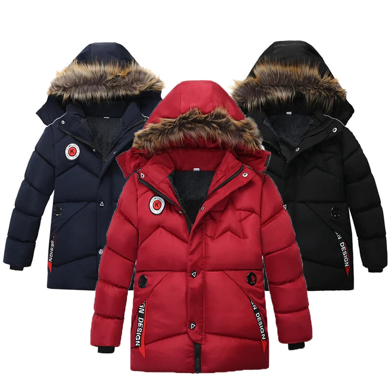 Red, navy, and black winter jackets with fur-lined hoods on a white background