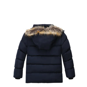 Navy blue puffer jacket with fur-lined hood on a white background
