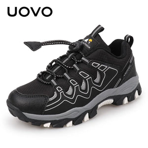 Black and gray hiking shoe with 'UOVO' branding on a white background