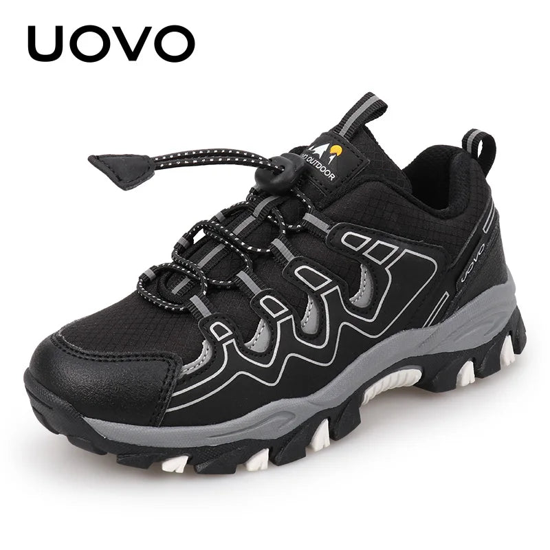 Black and gray hiking shoe with 'UOVO' branding on a white background