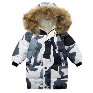 Camouflage-patterned winter jacket with a fur-lined hood on a white background