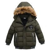 Green winter jacket with fur-lined hood on a white background