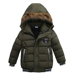 Green children's puffer jacket with fur-lined hood on a white background