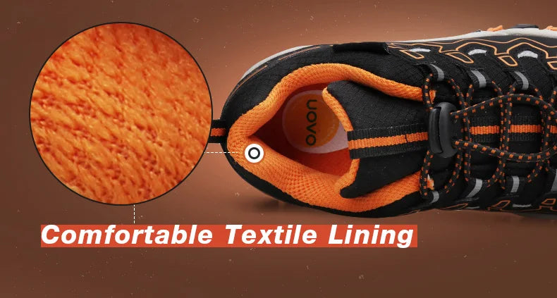 Close-up of a shoe with orange textural lining and brand logo on a brown background