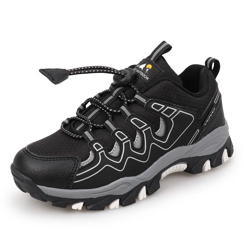 Black hiking shoe with gray accents on a white background