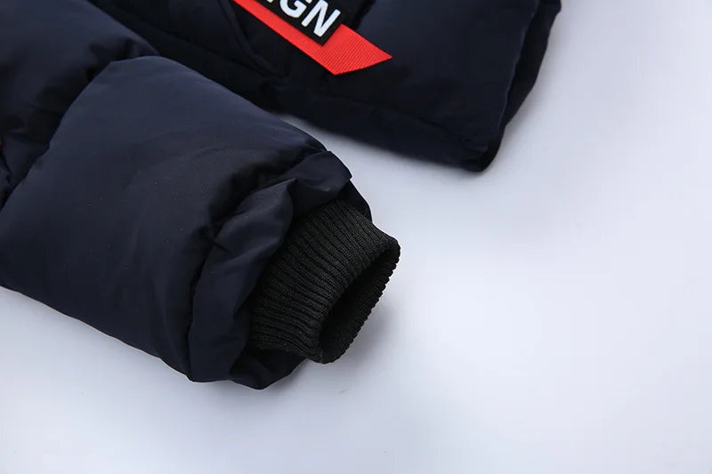 Black jacket with red and white logo on a white background