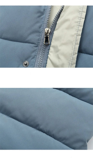 Close-up of a blue puffer jacket with a zipper and beige lining.