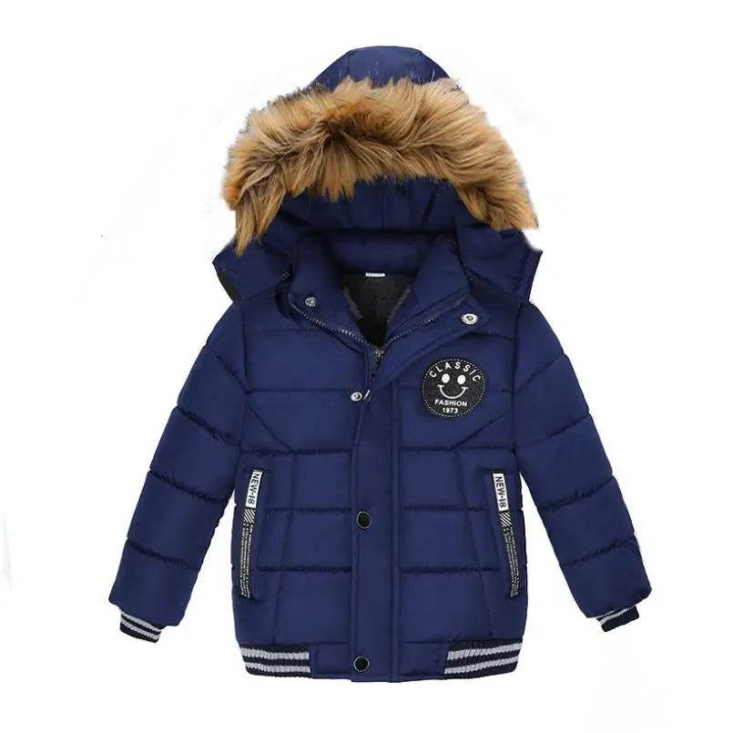 Blue children's winter jacket with fur-lined hood on a white background