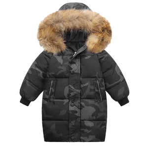 Black camouflage winter coat with brown fur hood on a white background