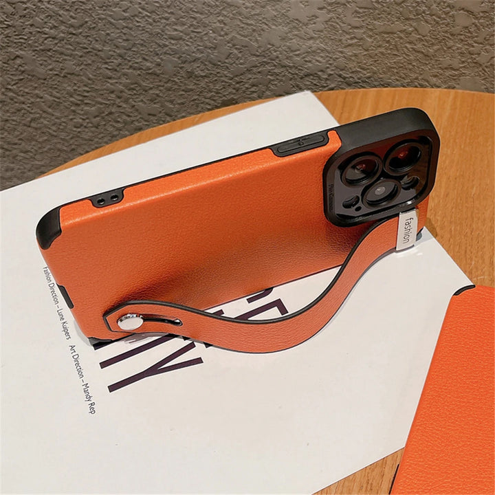 Luxury leather wrist strap stand iPhone case with full protection, fits iPhone 11, 12, 13, 14, 15, and 16 Pro Max & Plus.