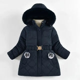 Black quilted jacket with fur hood and belt on a white background