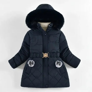 Black quilted jacket with fur hood and belt on a white background