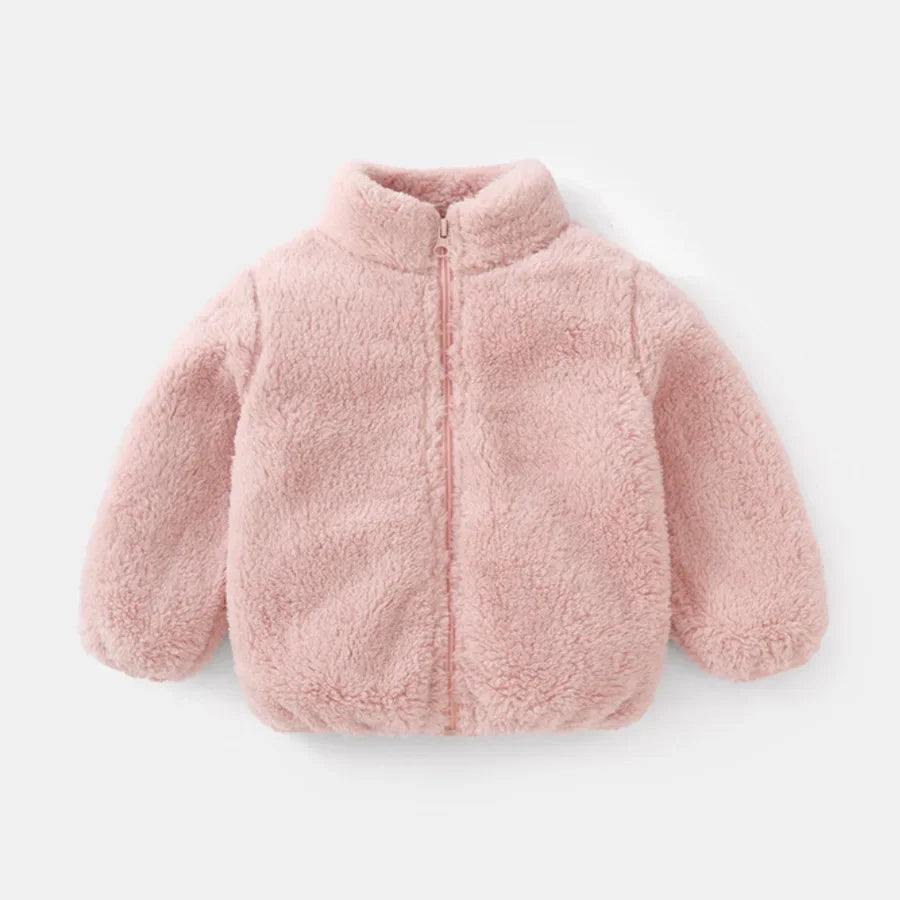Pink fluffy jacket on a light gray background