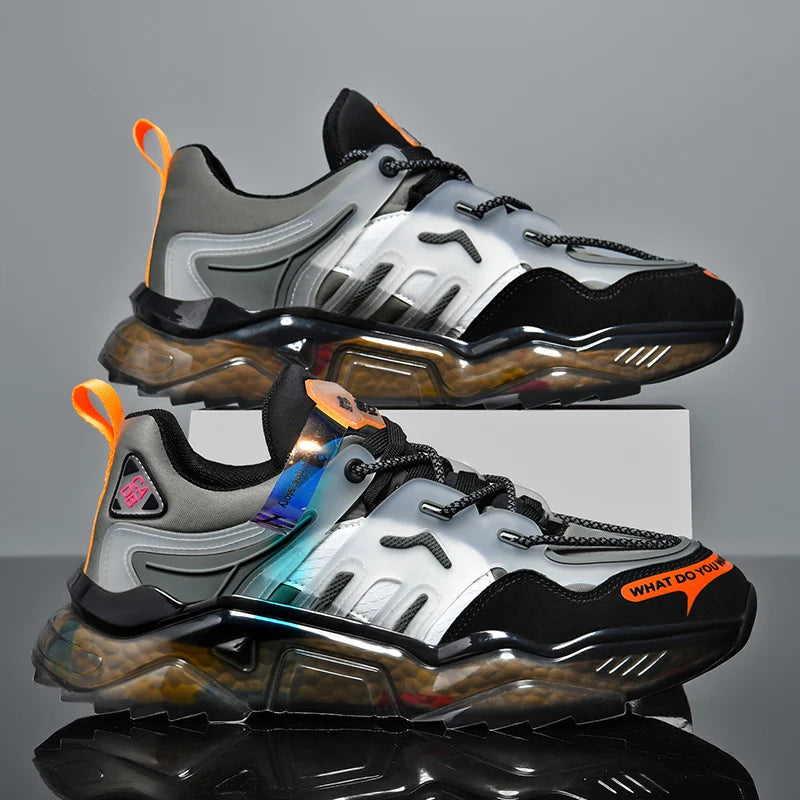 Pair of futuristic sneakers with reflective surfaces on a gray background
