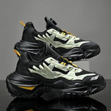 Black and white sneakers with yellow accents on a reflective surface and gray background