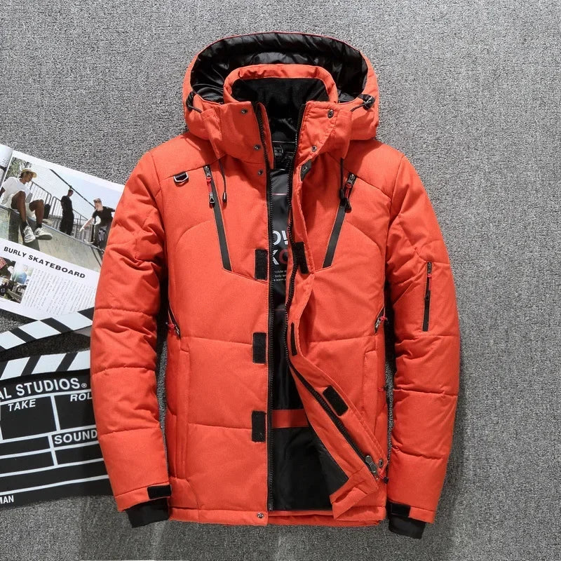 Orange winter jacket with black accents on a gray background