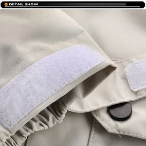 Close-up of beige fabric with white Velcro strip and black button, brand 'YAHOLFANYA' visible.