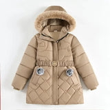 Beige quilted jacket with fur-lined hood on a white background