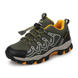 Green hiking shoe with yellow accents on a white background, featuring the UOVO brand.