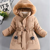 Beige winter coat with fur hood on a gray background