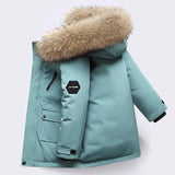 Light blue winter coat with fur hood on a light gray background