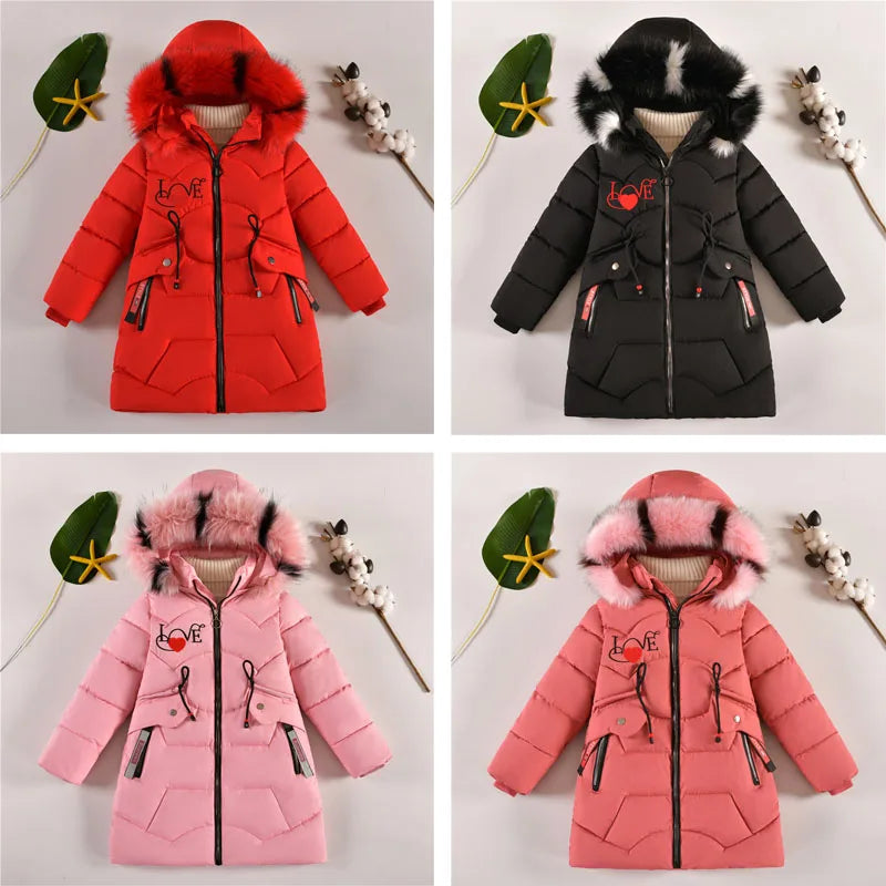 Four children's winter jackets in red, black, pink, and coral with fur-lined hoods on a neutral background.