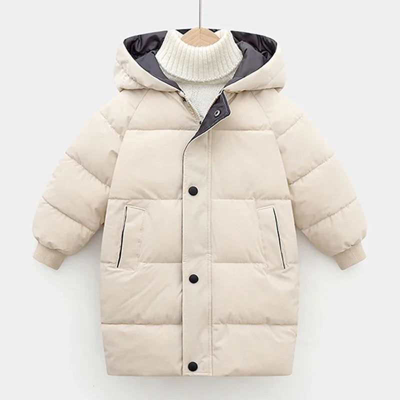 Beige puffer jacket with black buttons on a white background