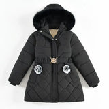 Black quilted jacket with fur-lined hood on a white background