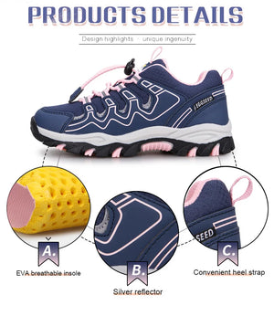Navy blue sneaker with pink accents and design features highlighted on a white background.