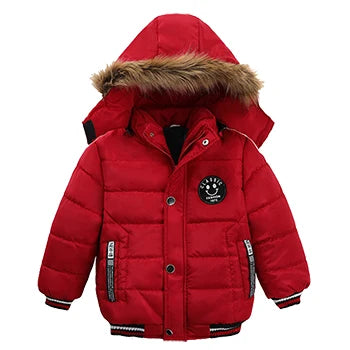 Red children's puffer jacket with fur-lined hood on a white background