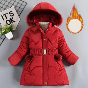 Red winter coat with fur trim on a gray background