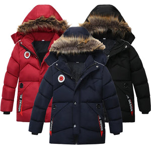 Three winter jackets in red, navy, and black with fur-lined hoods on a white background.