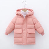 Pink children's puffer jacket on a hanger against a white background