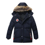 Navy blue winter jacket with fur-lined hood on a white background