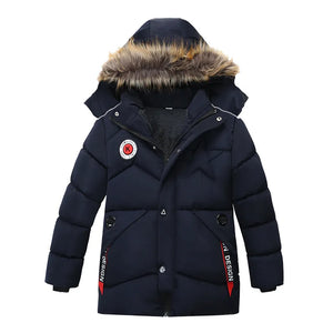 Navy blue winter jacket with fur-lined hood on a white background