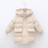 Beige puffer jacket on a hanger against a white background