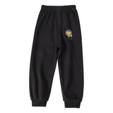 Black sweatpants with a yellow lion logo on a white background