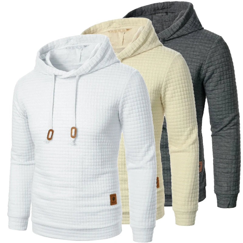 Three textured hoodies in white, beige, and gray on a white background