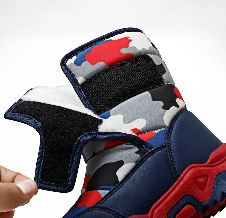 Colorful athletic shoe with a camouflage pattern held by a hand against a white background