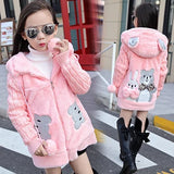 Child wearing a pink hooded coat with bear designs on a crosswalk.