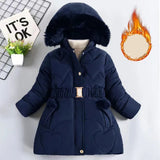 Navy blue winter coat with fur hood on a white background